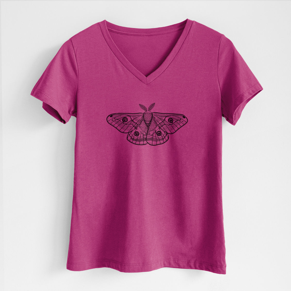 Berry pink women's relaxed fit cotton V-neck t-shirt laid flat, printed with a detailed black ink illustration of a small emperor moth with eyespots on its wings.