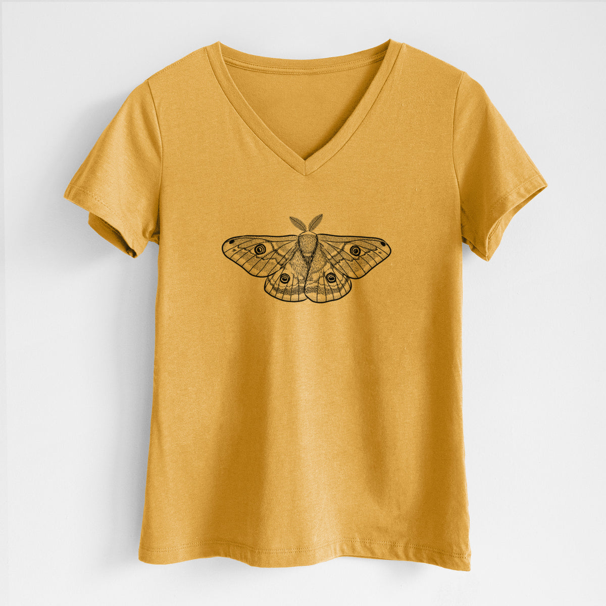 Honeycomb yellow women's relaxed fit cotton V-neck t-shirt laid flat, printed with a detailed black ink illustration of a small emperor moth with eyespots on its wings.