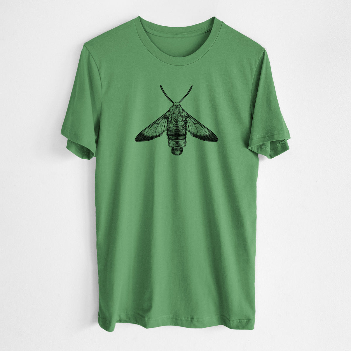 Leaf green lightweight cotton t-shirt laid flat, printed with a detailed black ink illustration of a snowberry clearwing moth, seen from above.