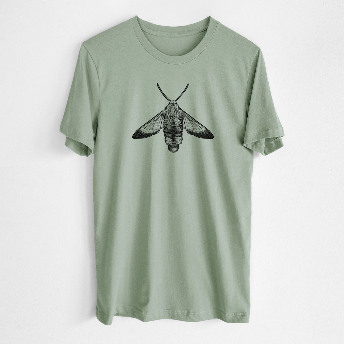 Sage green lightweight cotton t-shirt laid flat, printed with a detailed black ink illustration of a snowberry clearwing moth, seen from above.