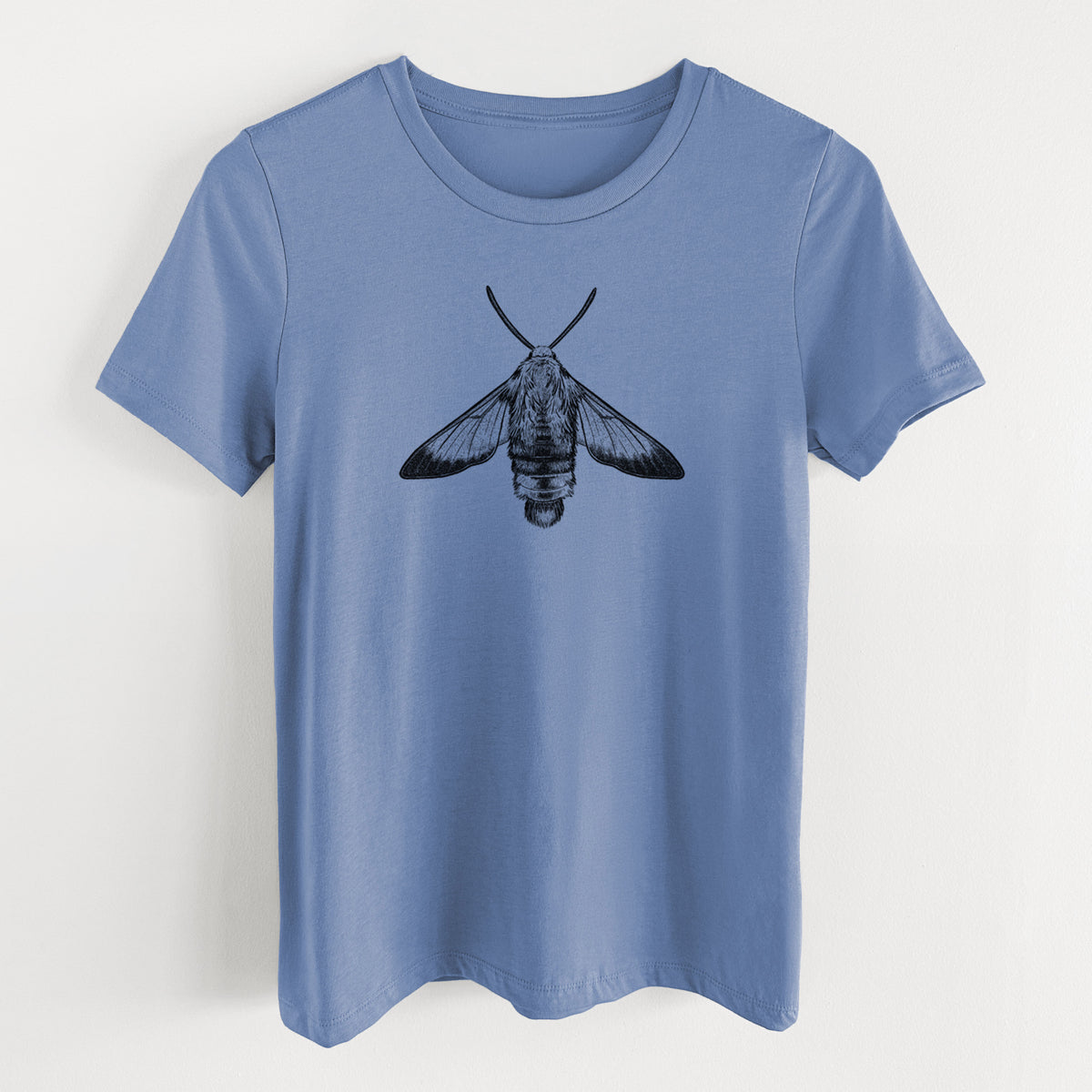 Blue bell women's relaxed fit cotton t-shirt laid flat, printed with a detailed black ink illustration of a snowberry clearwing moth, seen from above.