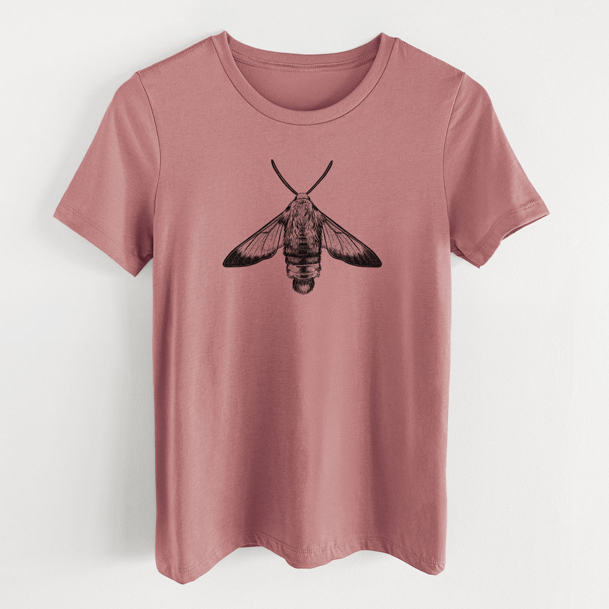 Mauve pink women's relaxed fit cotton t-shirt laid flat, printed with a detailed black ink illustration of a snowberry clearwing moth, seen from above.