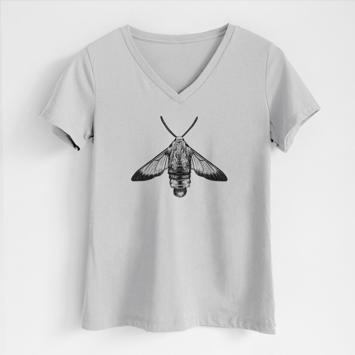 Lunar grey women's relaxed fit cotton V-neck t-shirt laid flat, printed with a detailed black ink illustration of a snowberry clearwing moth, seen from above.