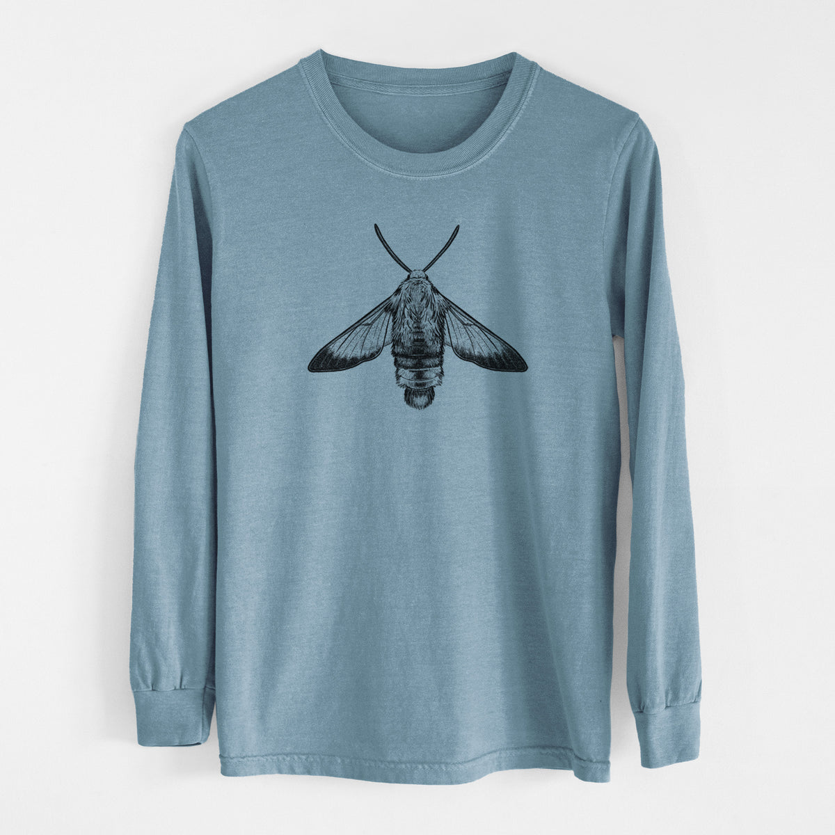 Steel blue Comfort Colors long sleeve shirt laid flat, printed with a detailed black ink illustration of a snowberry clearwing moth, seen from above.
