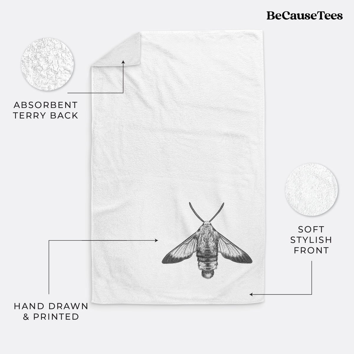 White hand towel printed with a detailed black ink illustration of a snowberry clearwing moth, seen from above.