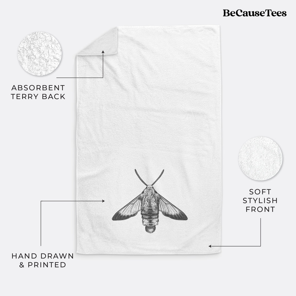 White hand towel printed with a detailed black ink illustration of a snowberry clearwing moth, seen from above.