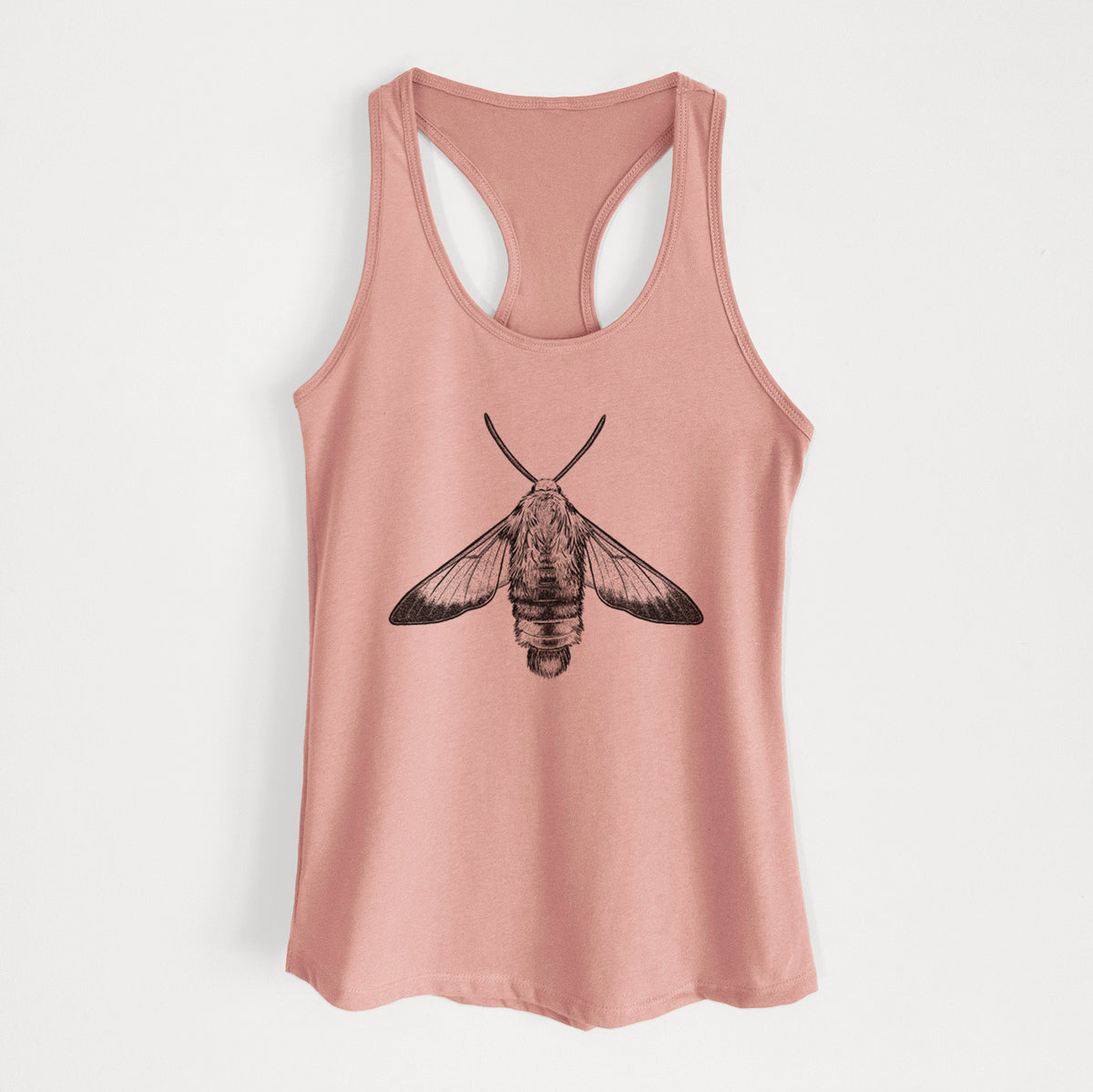 Desert pink women's racerback tank top laid flat, printed with a detailed black ink illustration of a snowberry clearwing moth, seen from above.