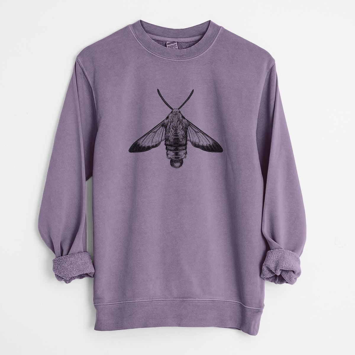 Plum purple pigment dyed crewneck sweatshirt laid flat with the sleeves rolled, printed with a detailed black ink illustration of a snowberry clearwing moth, seen from above.