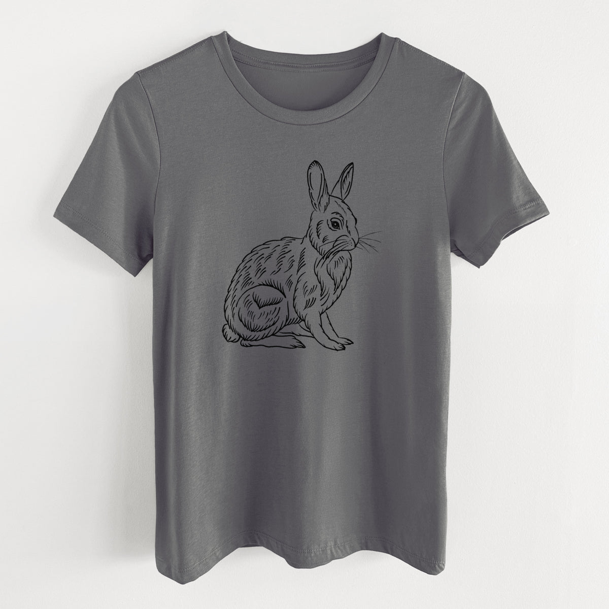 Asphalt women's relaxed fit cotton t-shirt laid flat, printed with a detailed black ink illustration of a snowshoe hare sitting upright.