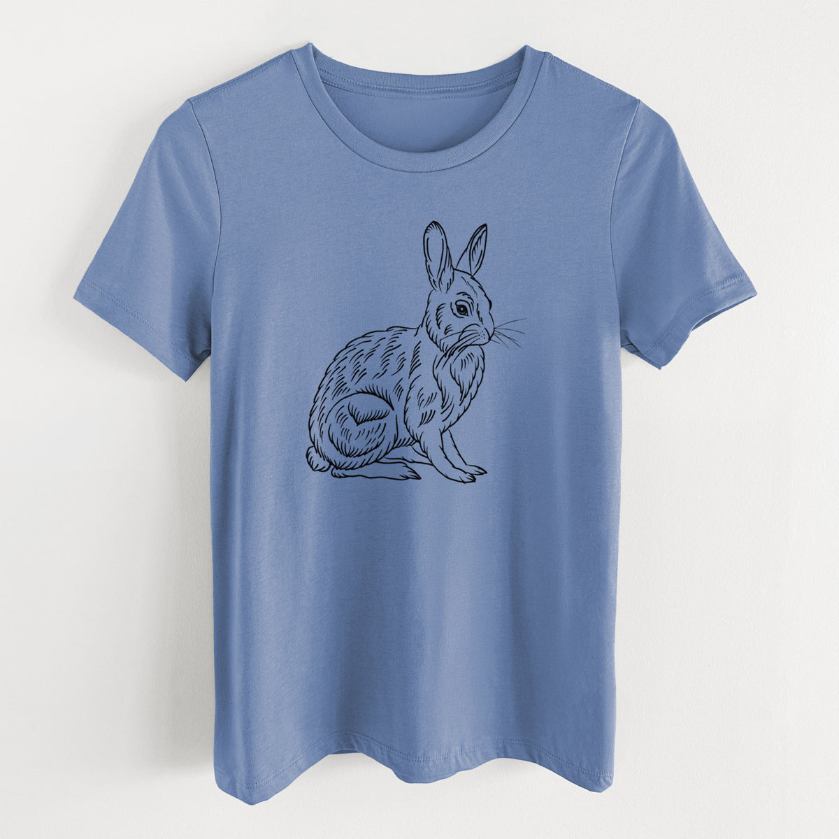 Blue bell women's relaxed fit cotton t-shirt laid flat, printed with a detailed black ink illustration of a snowshoe hare sitting upright.