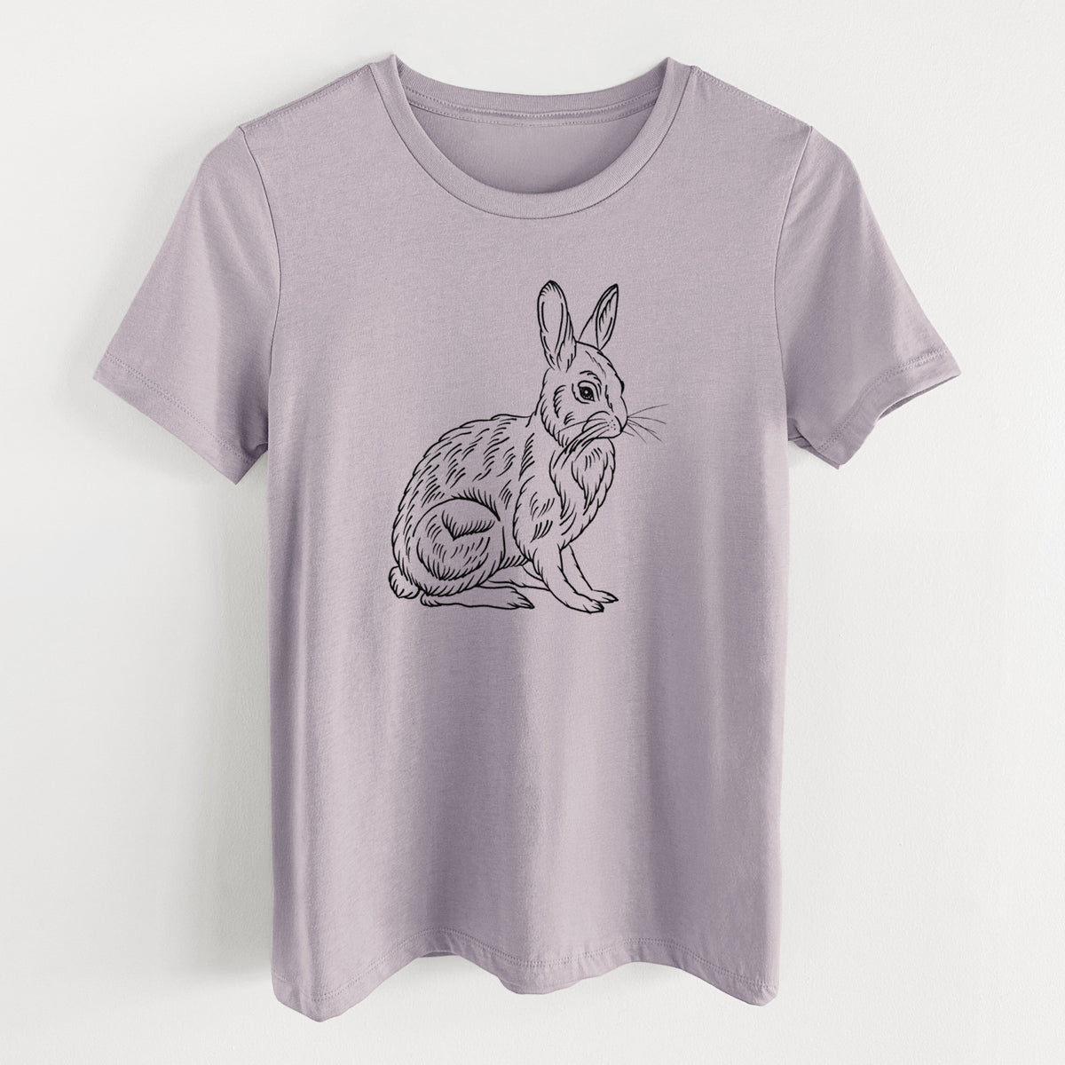 Light violet women's relaxed fit cotton t-shirt laid flat, printed with a detailed black ink illustration of a snowshoe hare sitting upright.
