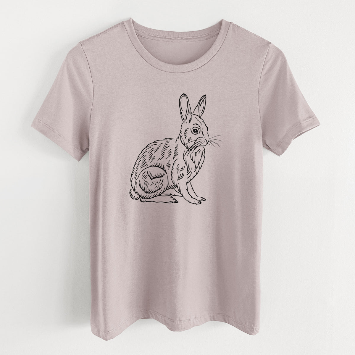 Pink gravel women's relaxed fit cotton t-shirt laid flat, printed with a detailed black ink illustration of a snowshoe hare sitting upright.