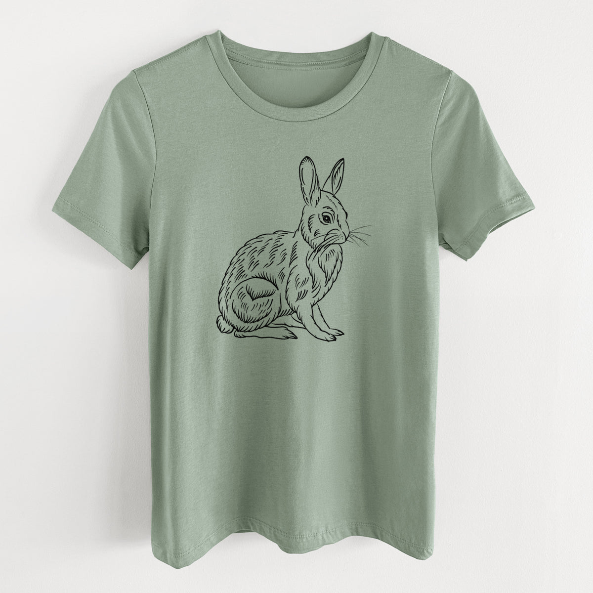 Sage green women's relaxed fit cotton t-shirt laid flat, printed with a detailed black ink illustration of a snowshoe hare sitting upright.