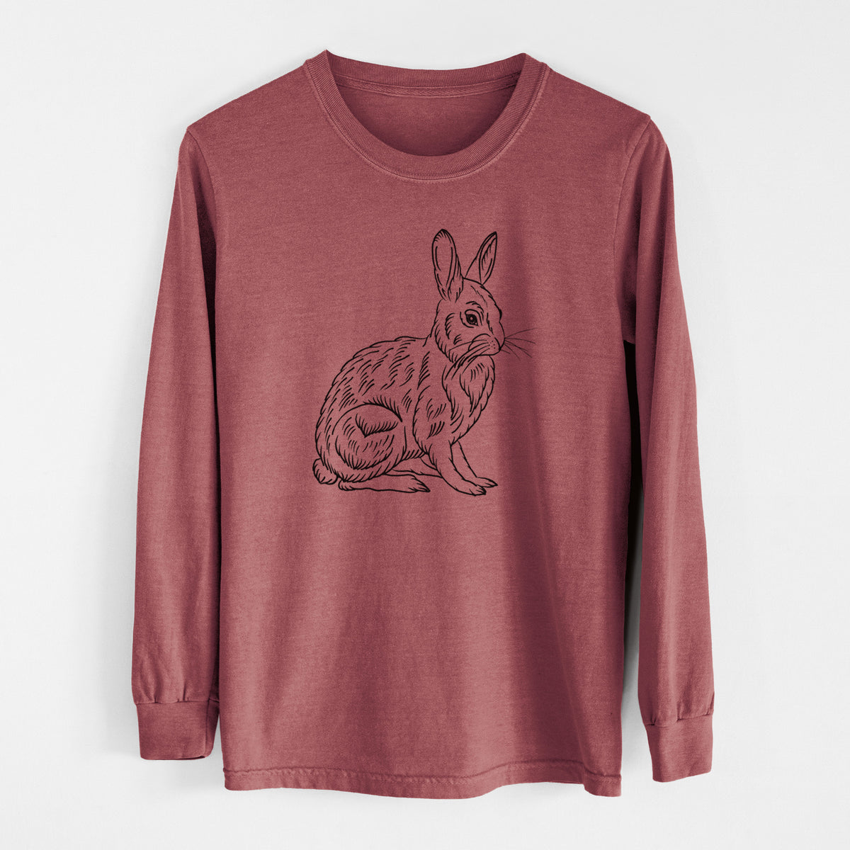 Brick red Comfort Colors long sleeve shirt laid flat, printed with a detailed black ink illustration of a snowshoe hare sitting upright.