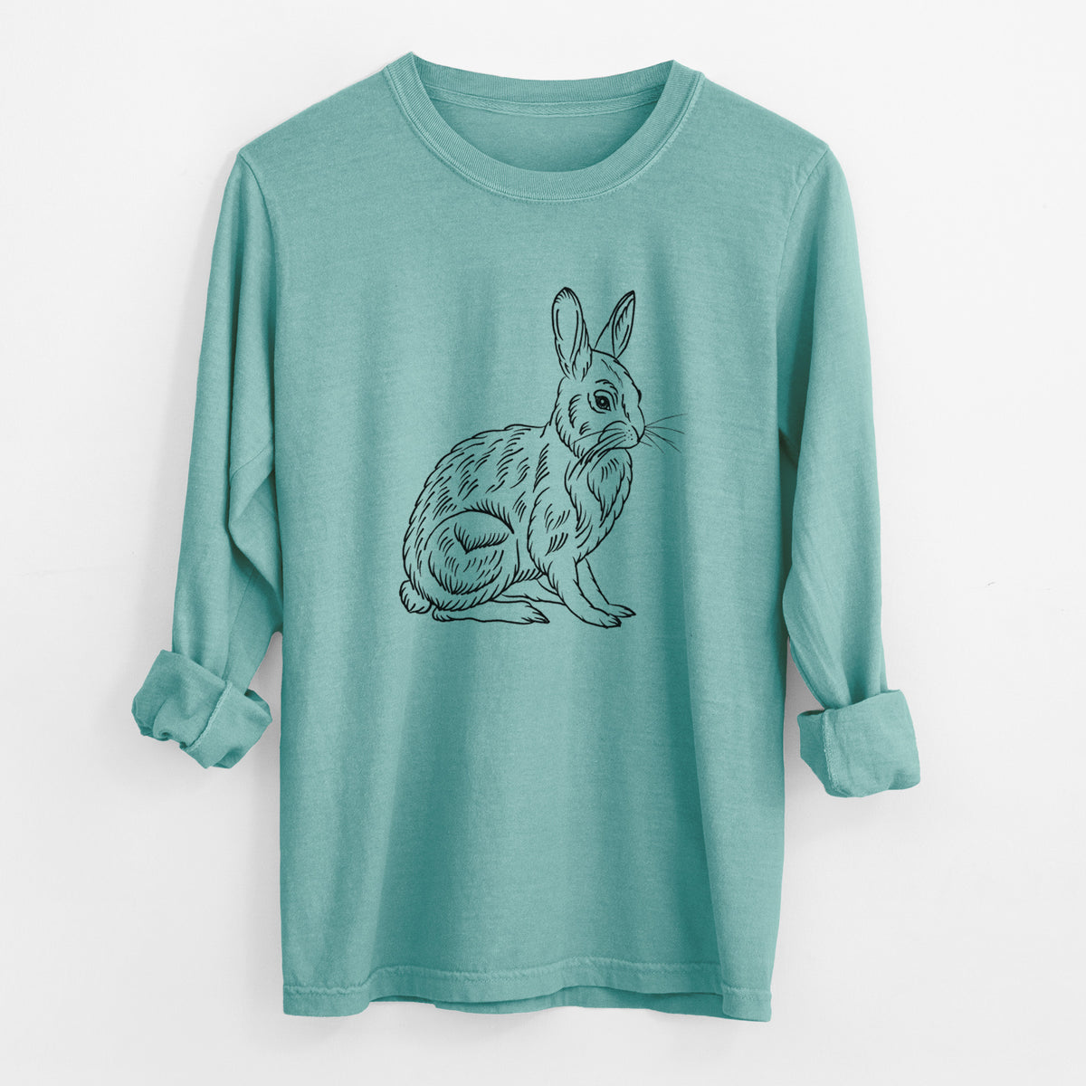 Reef green Comfort Colors long sleeve shirt laid flat with the cuffs rolled, printed with a detailed black ink illustration of a snowshoe hare sitting upright.