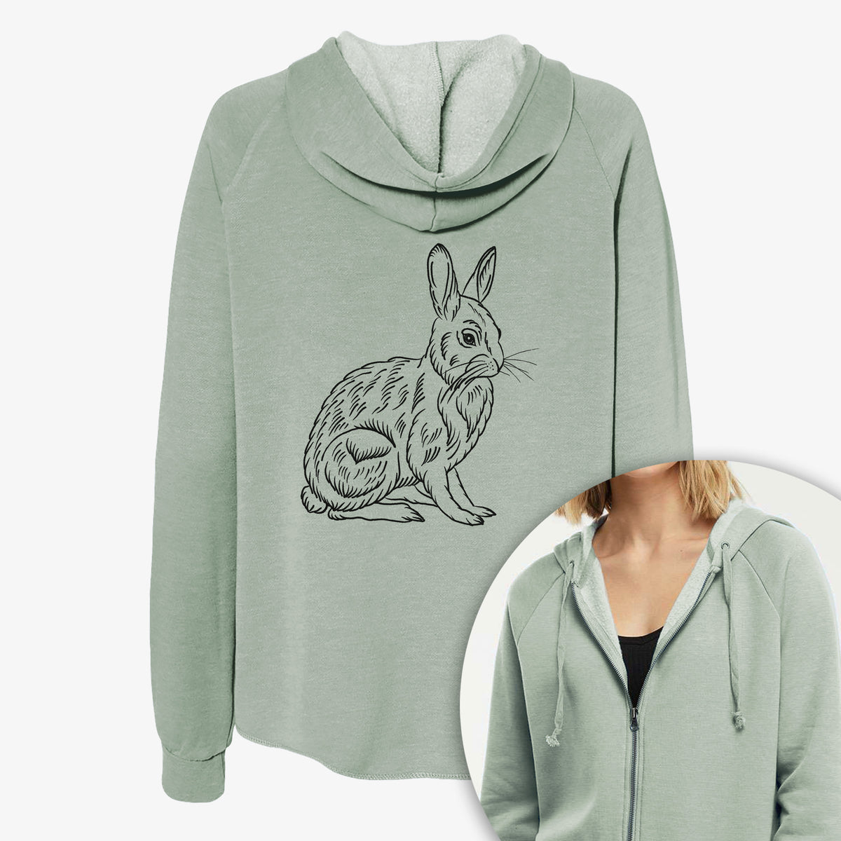 Women's Cali Wave zip-up sweatshirt printed with a detailed black ink illustration of a snowshoe hare sitting upright, with a close-up of the zipper.