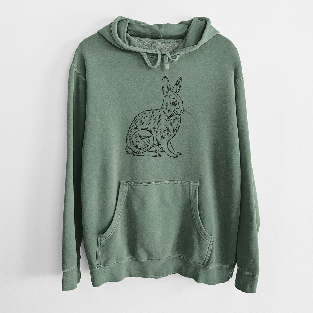 Alpine green pigment dyed hoodie laid flat, printed with a detailed black ink illustration of a snowshoe hare sitting upright.