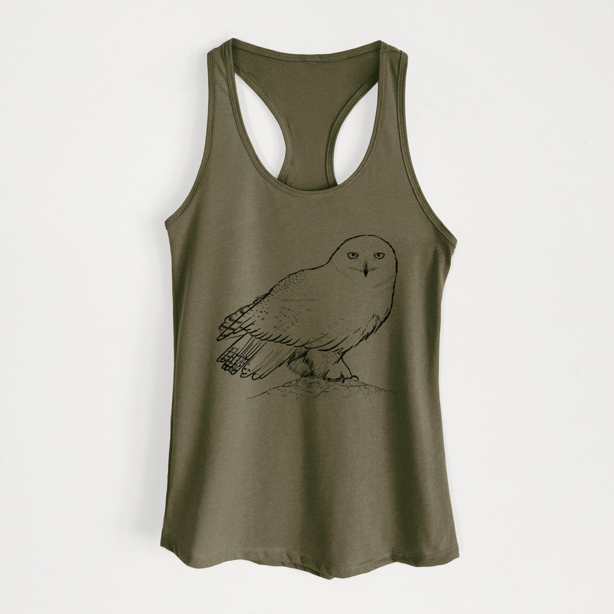 Military green women's racerback tank top laid flat, printed with a detailed black ink illustration of a snowy owl perched on a snowy mound.