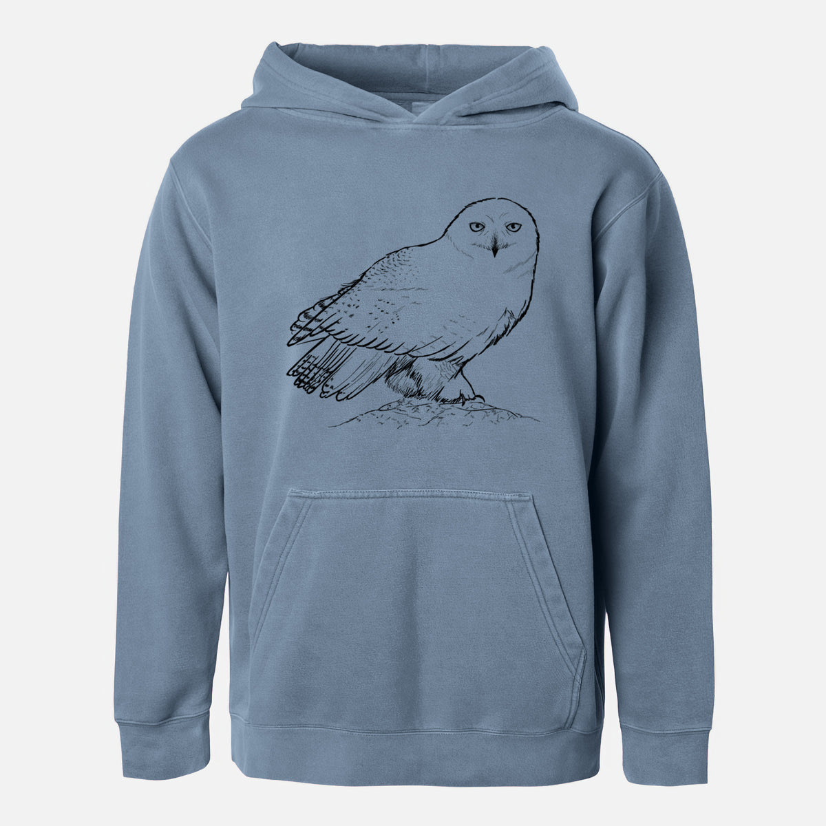Slate blue youth pigment dyed hoodie laid flat, printed with a detailed black ink illustration of a snowy owl perched on a snowy mound.
