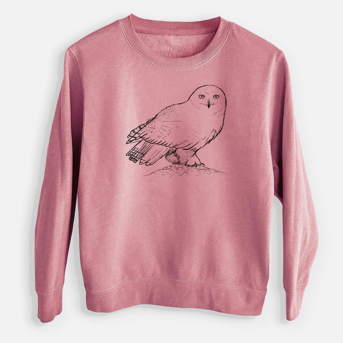 Mauve pink youth crewneck sweatshirt laid flat, printed with a detailed black ink illustration of a snowy owl perched on a snowy mound.