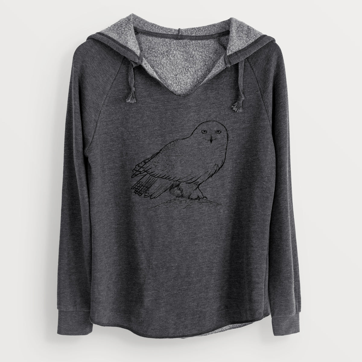 Charcoal grey women's Cali Wave hooded sweatshirt laid flat, printed with a detailed black ink illustration of a snowy owl perched on a snowy mound.