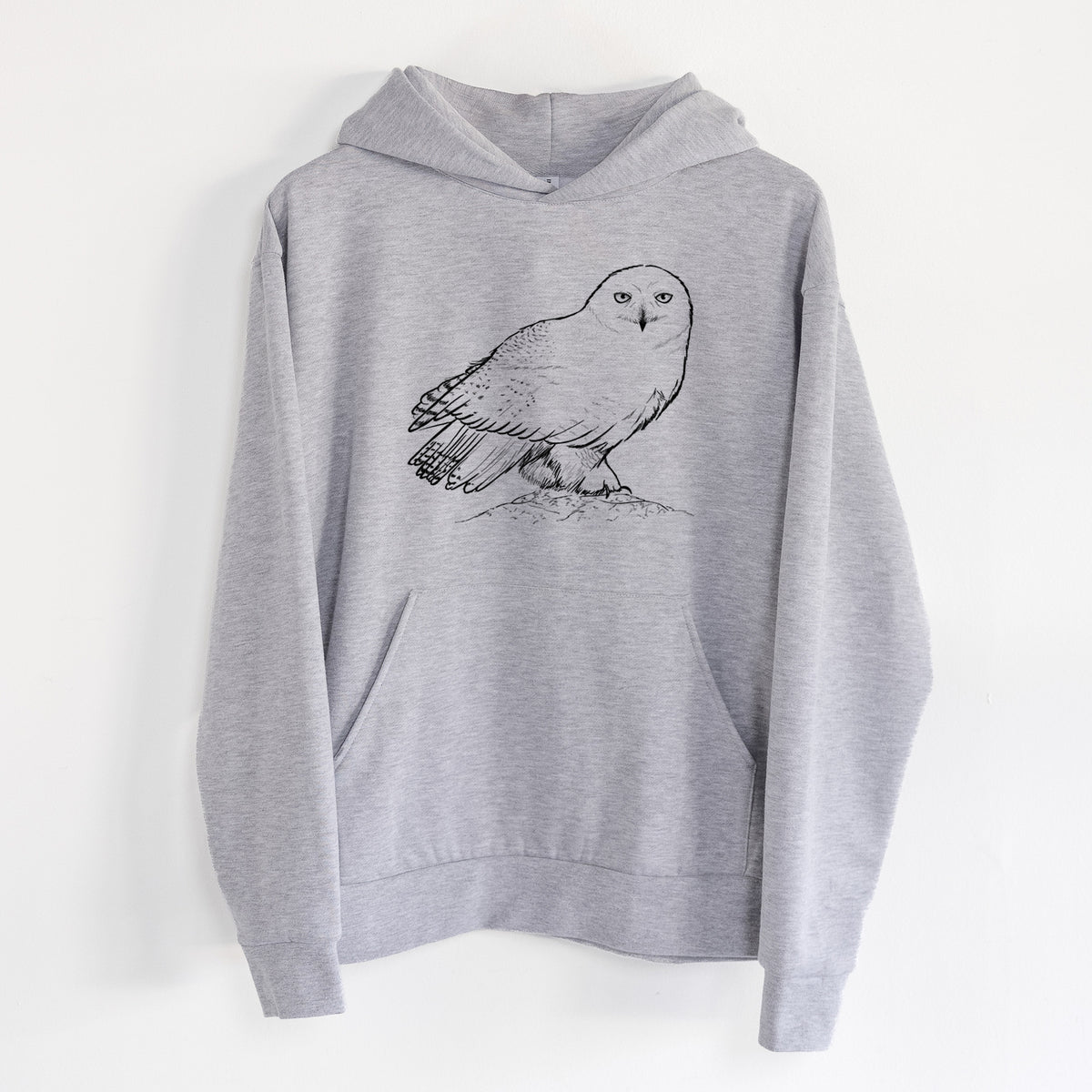 Snowy Owl - Bubo scandiacus - Statement Midweight Hoodie in Heather Grey, hanging on a white wall, with a front kangaroo pocket and no drawcords.