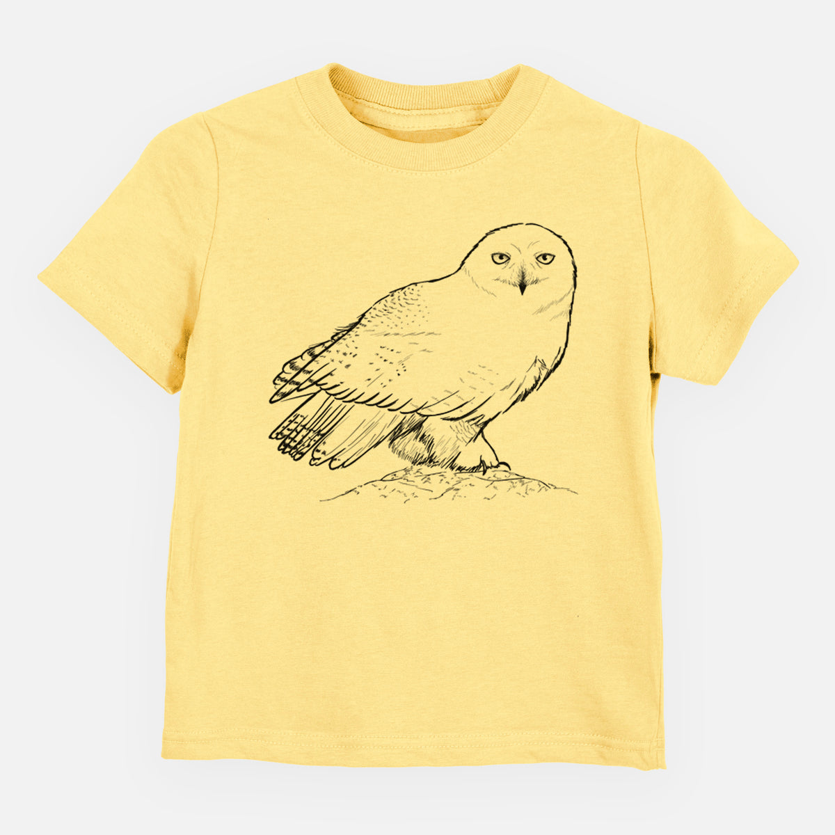 Butter yellow toddler t-shirt laid flat, printed with a detailed black ink illustration of a snowy owl perched on a snowy mound.