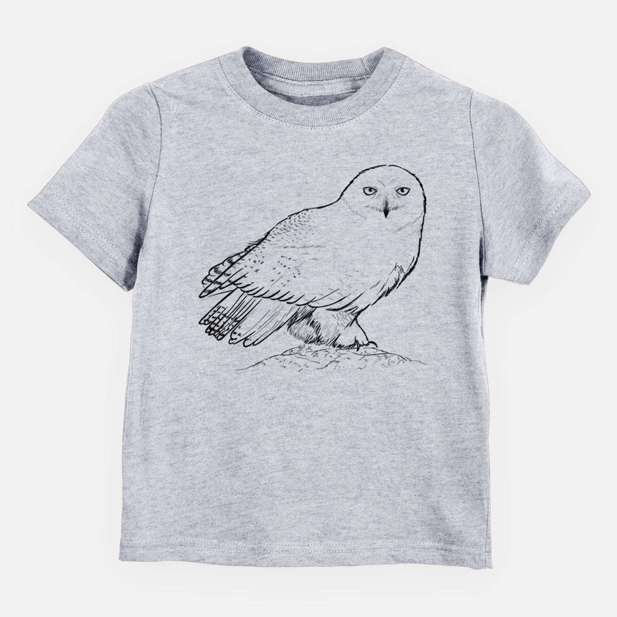 Heather grey toddler t-shirt laid flat, printed with a detailed black ink illustration of a snowy owl perched on a snowy mound.