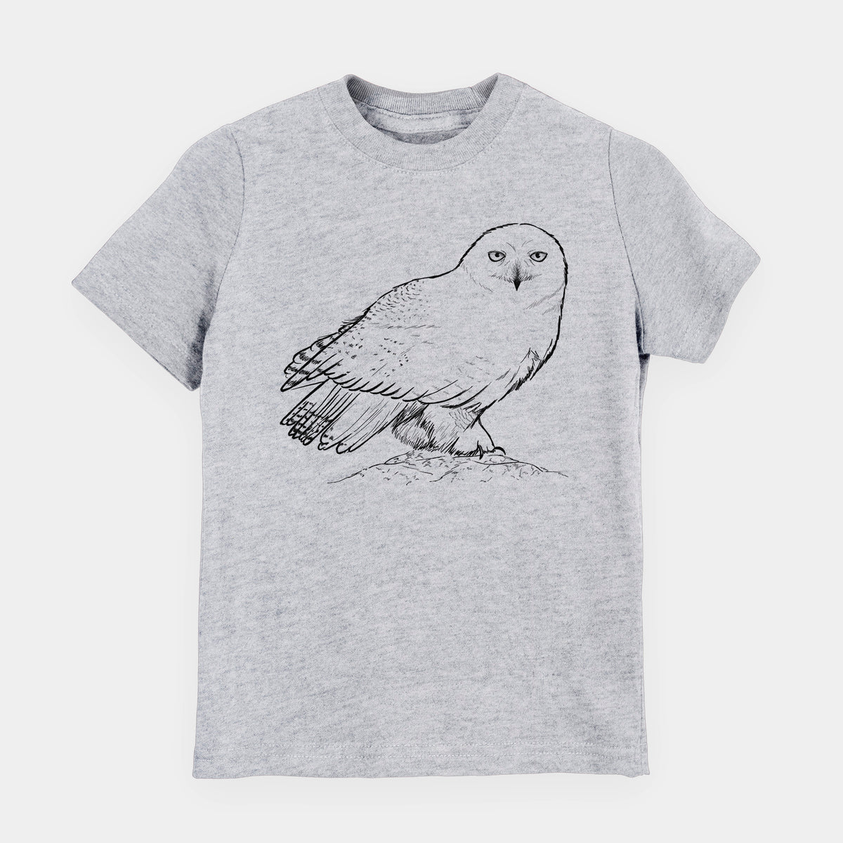 Heather grey youth t-shirt laid flat, printed with a detailed black ink illustration of a snowy owl perched on a snowy mound.