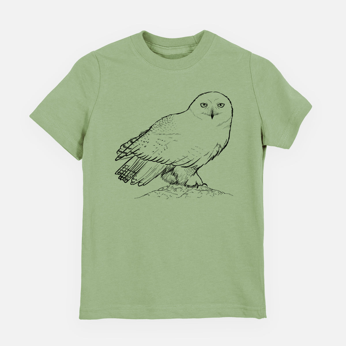 Sage green youth t-shirt laid flat, printed with a detailed black ink illustration of a snowy owl perched on a snowy mound.