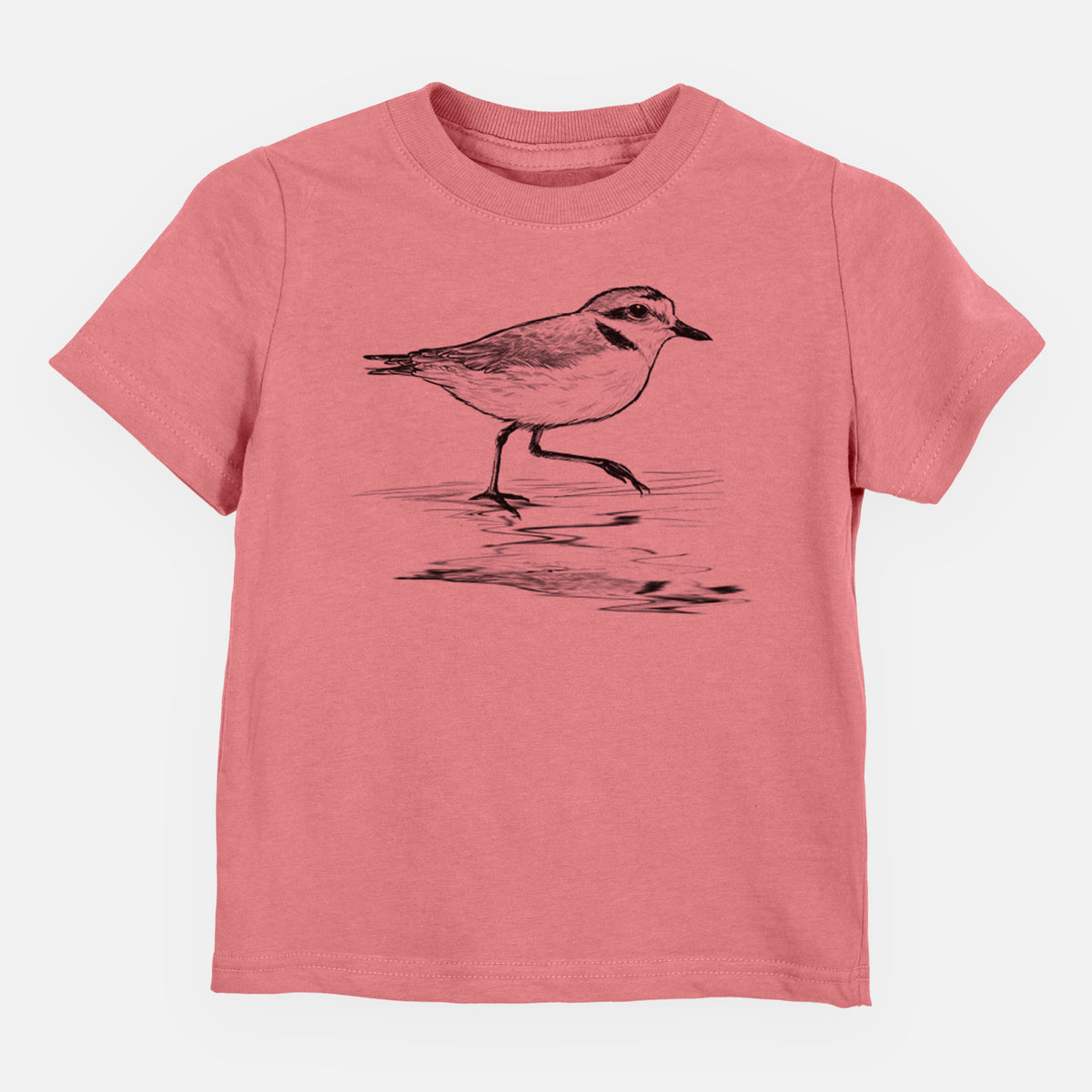 Mauve pink toddler t-shirt laid flat, printed with a black ink sketch of a snowy plover running along the wet shoreline.