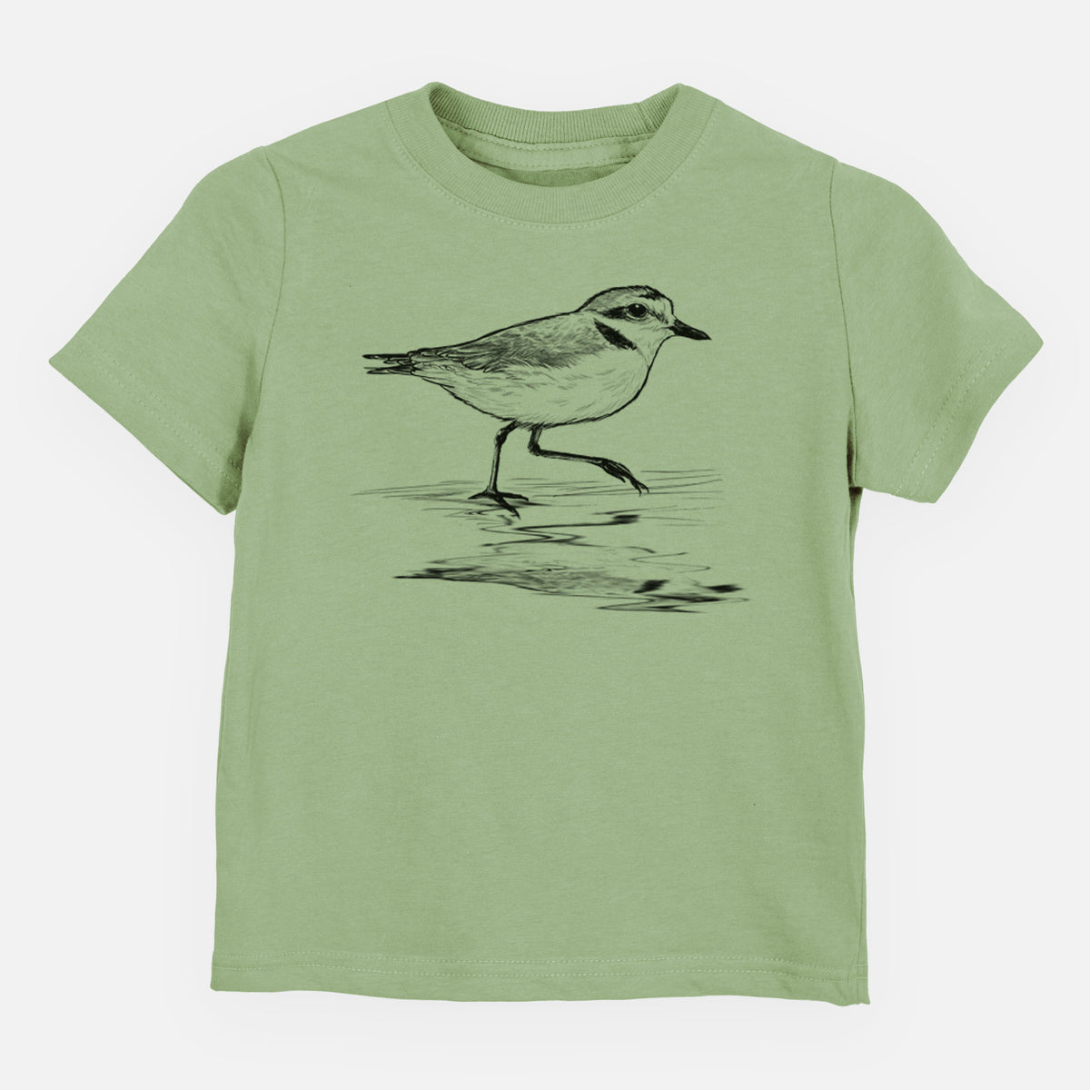 Sage green toddler t-shirt laid flat, printed with a black ink sketch of a snowy plover running along the wet shoreline.