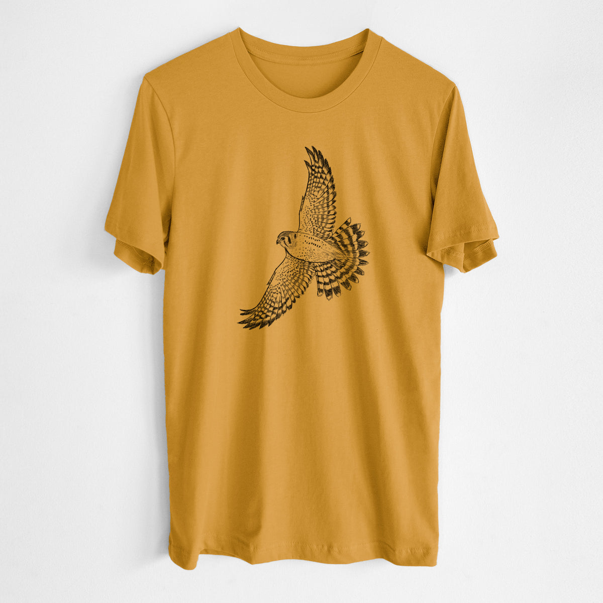 Honeycomb yellow lightweight cotton t-shirt laid flat, printed with a detailed black ink illustration of an American kestrel in flight with its wings raised.