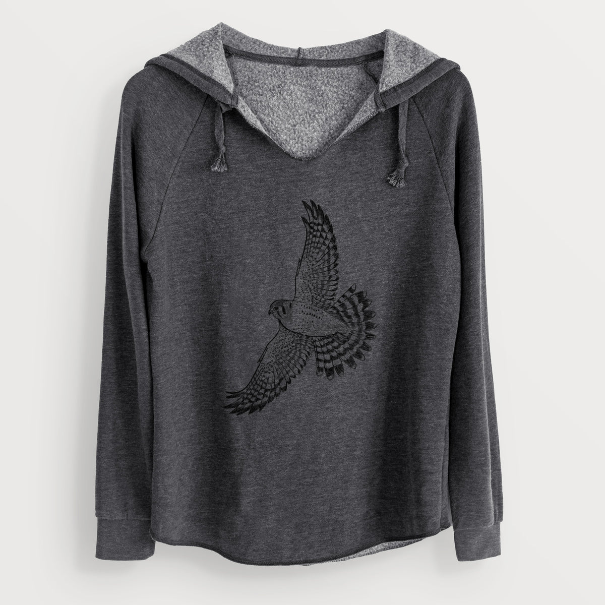 Charcoal grey women's Cali Wave hooded sweatshirt laid flat, printed with a detailed black ink illustration of an American kestrel in flight with its wings raised.