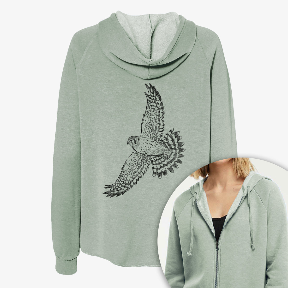 Women's Cali Wave zip-up sweatshirt printed with a detailed black ink illustration of an American kestrel in flight with its wings raised, with a close-up of the zipper.