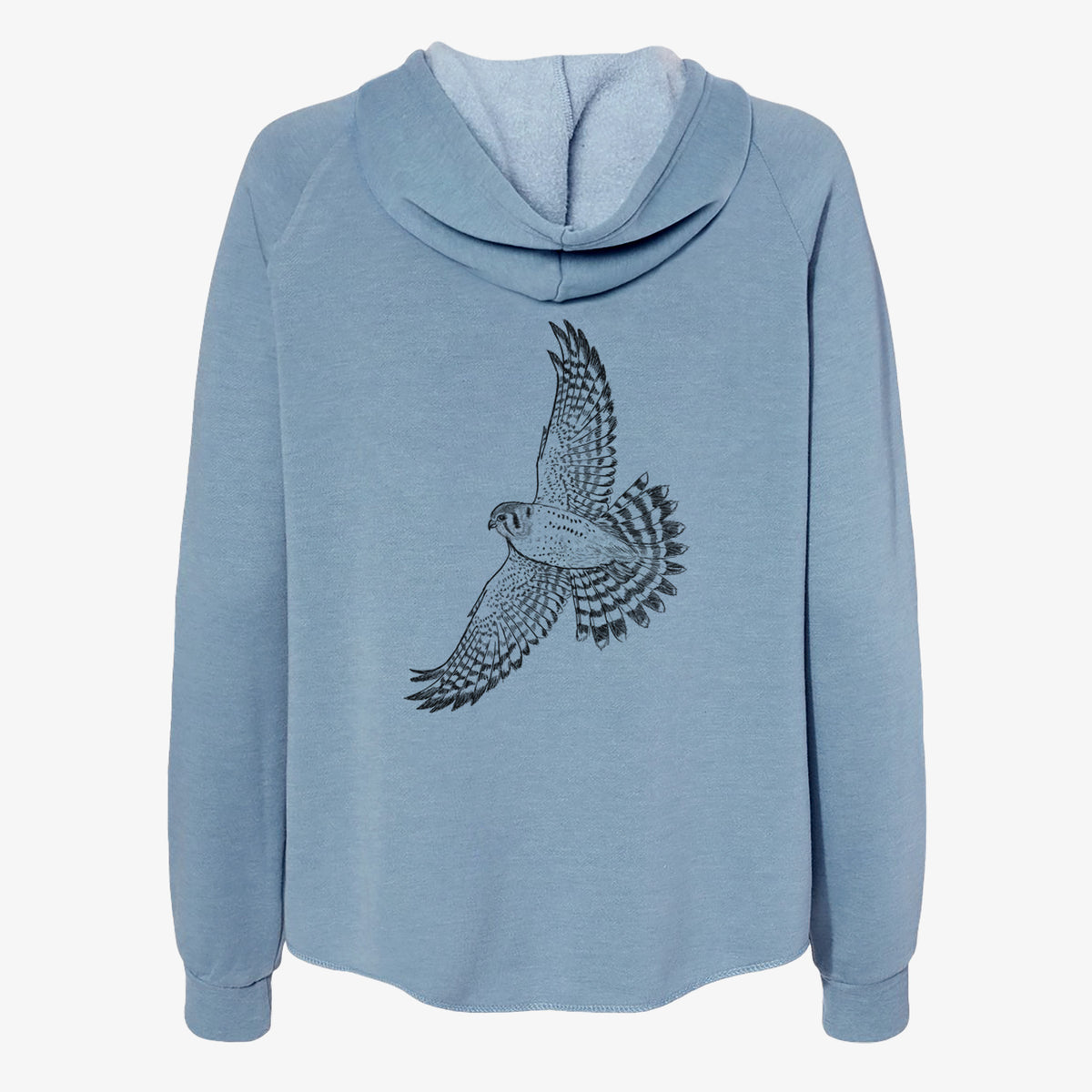 Misty blue women's Cali Wave zip-up sweatshirt laid flat, printed with a detailed black ink illustration of an American kestrel in flight with its wings raised.