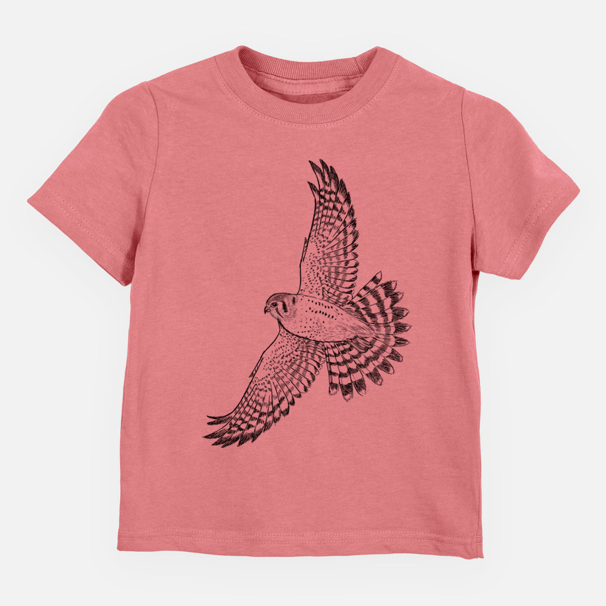 Mauve pink toddler t-shirt laid flat, printed with a detailed black ink illustration of an American kestrel in flight with its wings raised.