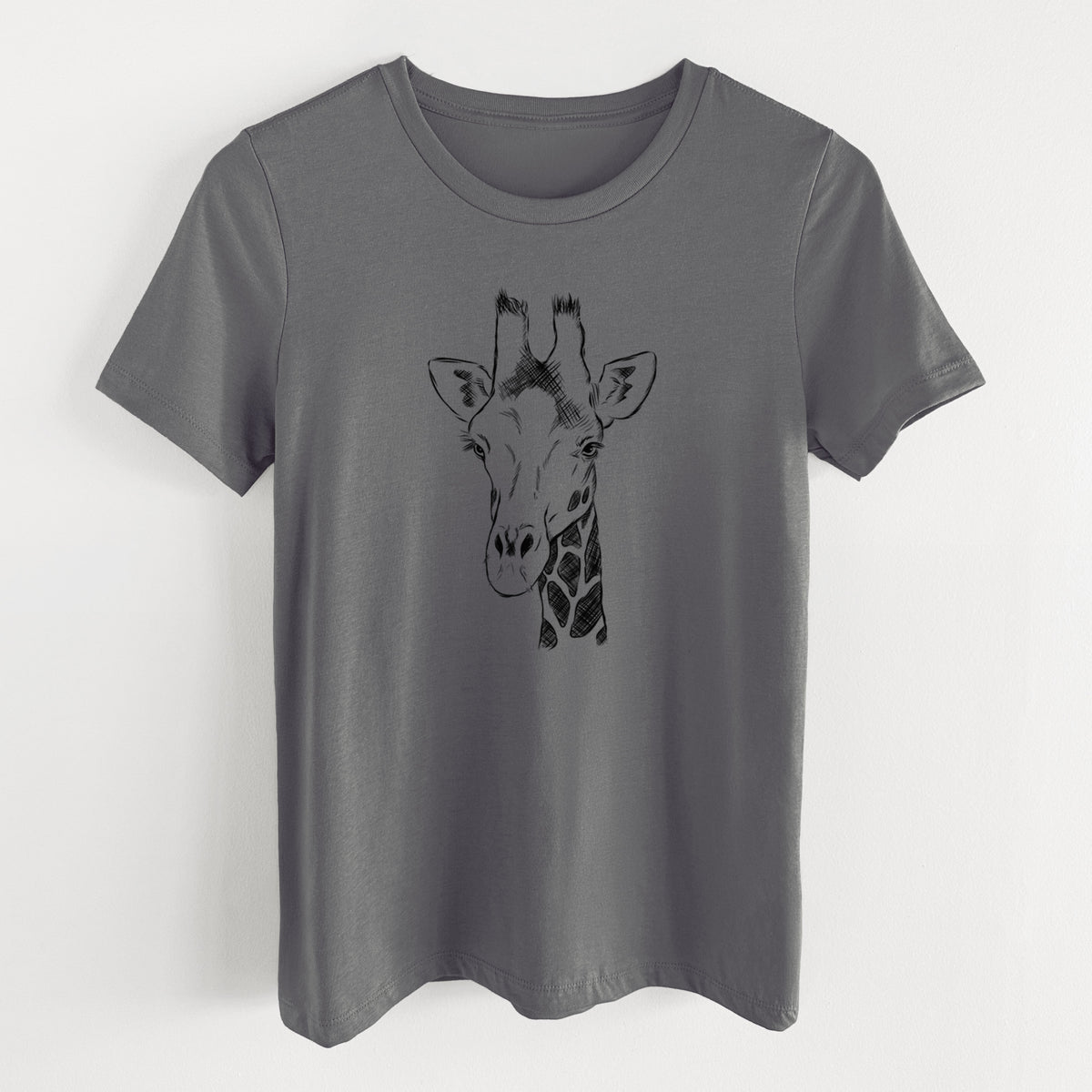Asphalt women's relaxed fit cotton t-shirt laid flat, printed with a black ink portrait of a southern giraffe's head and neck.