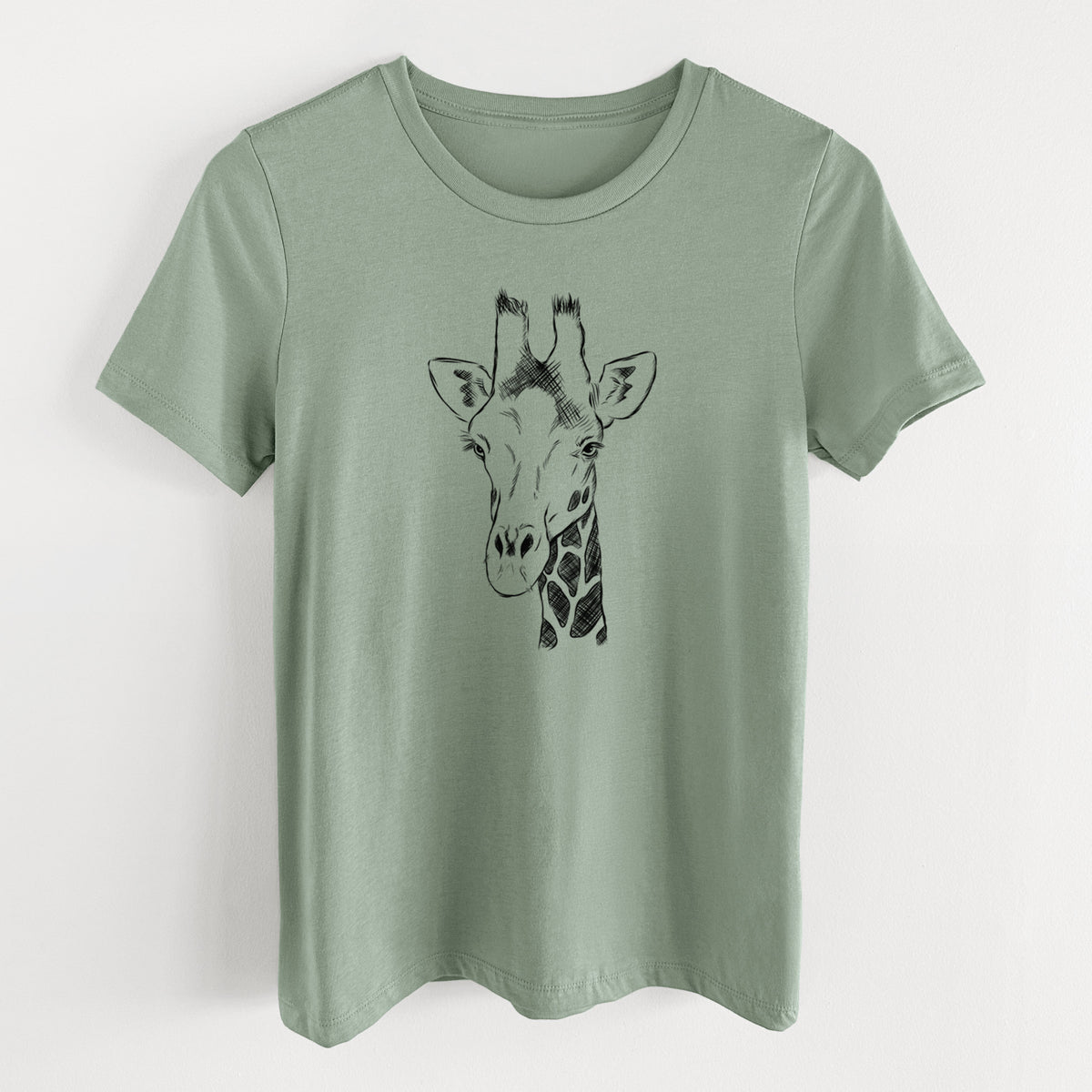 Sage green women's relaxed fit cotton t-shirt laid flat, printed with a black ink portrait of a southern giraffe's head and neck.
