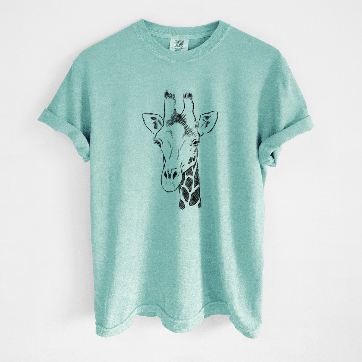 Chalky mint Comfort Colors t-shirt laid flat, printed with a black ink portrait of a southern giraffe's head and neck.