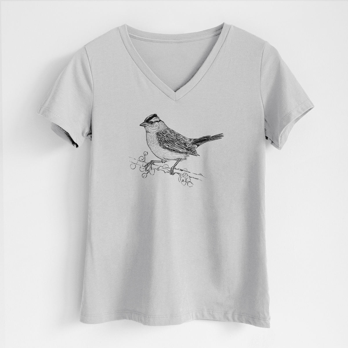 Lunar grey women's relaxed fit cotton V-neck t-shirt laid flat, printed with a detailed black ink sketch of a white-crowned sparrow perched on a branch.
