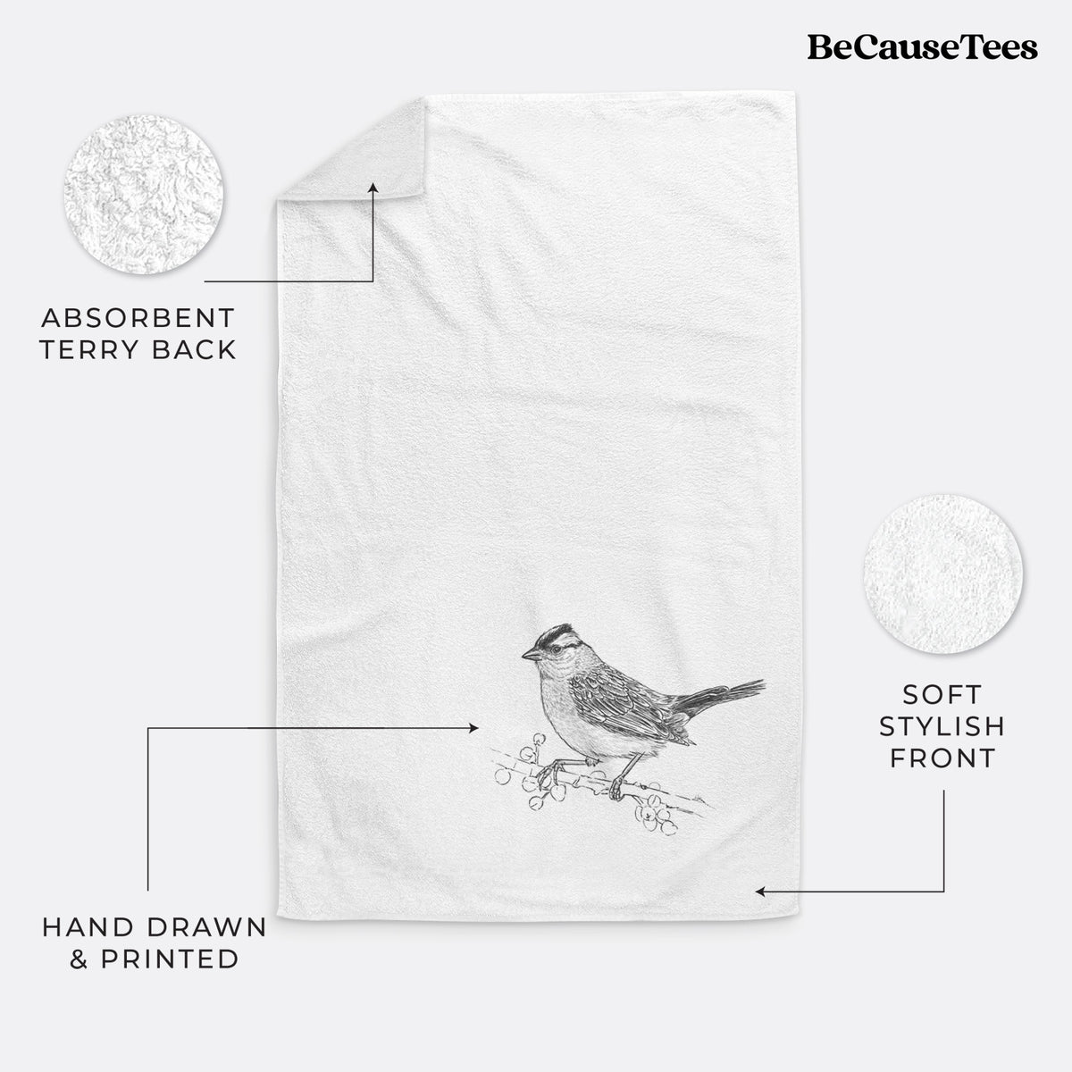 White hand towel printed with a detailed black ink sketch of a white-crowned sparrow perched on a branch.