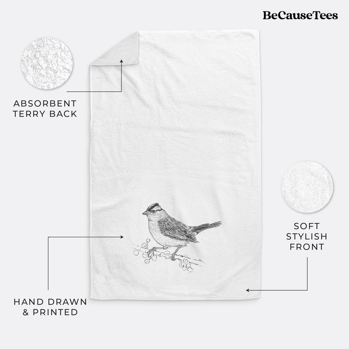 White hand towel printed with a detailed black ink sketch of a white-crowned sparrow perched on a branch.