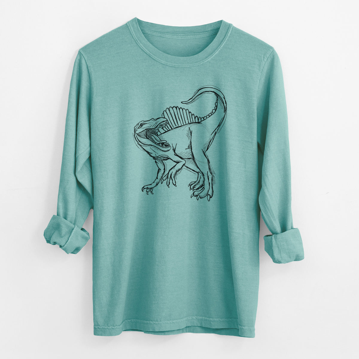 Reef green Comfort Colors long sleeve shirt laid flat with the cuffs rolled, printed with a black ink illustration of a Spinosaurus with its tall sail-shaped back.