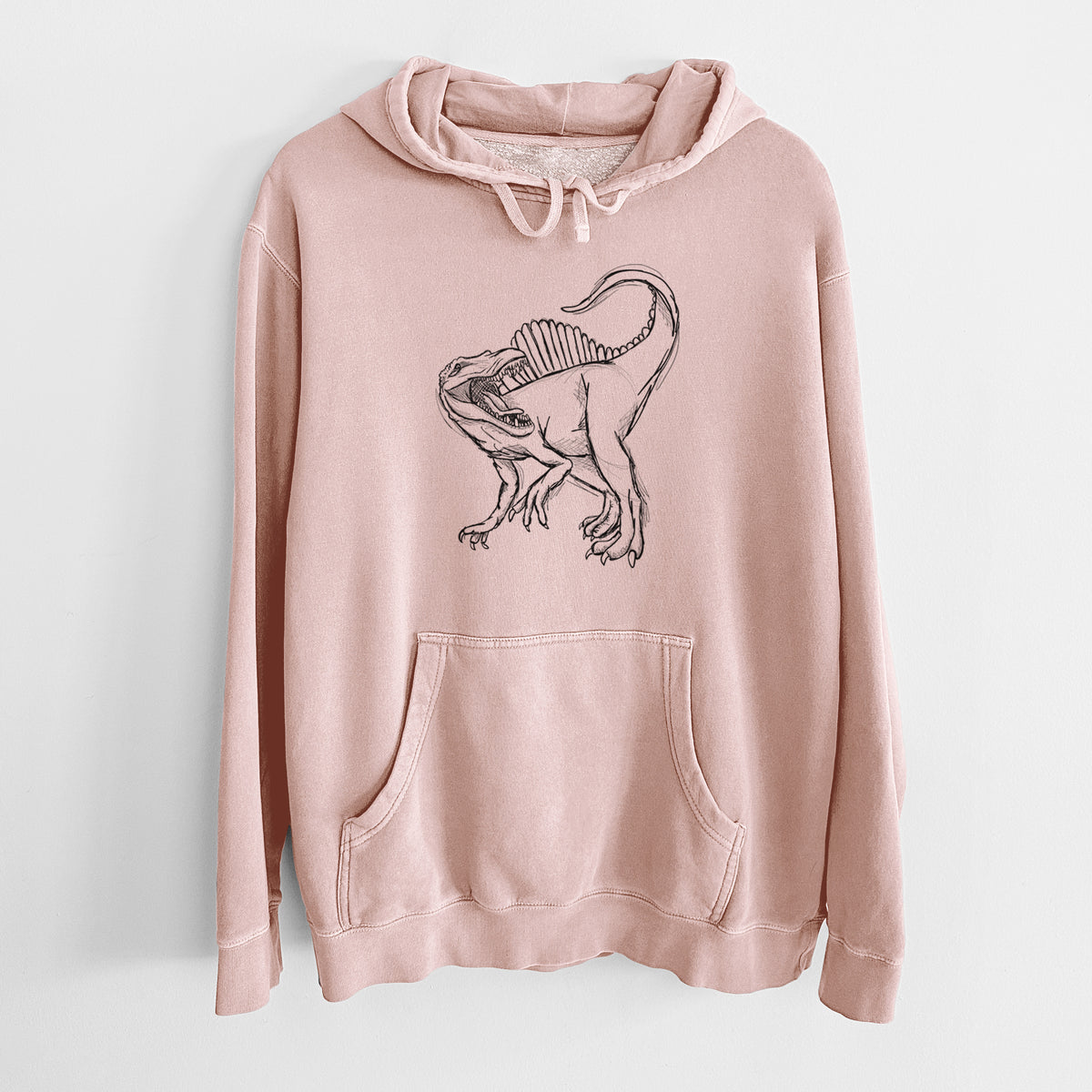 Dusty pink pigment dyed hoodie laid flat, printed with a black ink illustration of a Spinosaurus with its tall sail-shaped back.