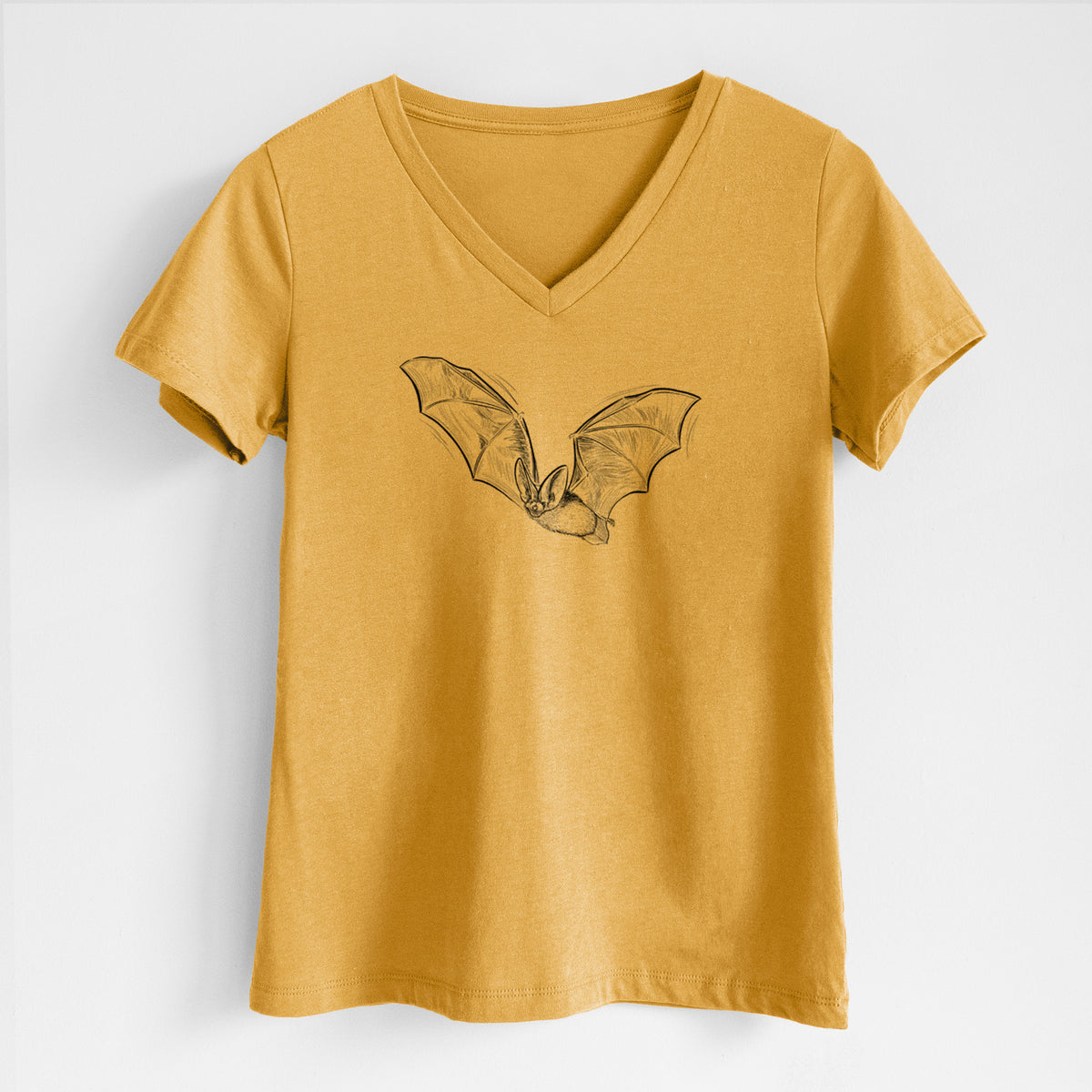 Honeycomb yellow women's relaxed fit cotton V-neck t-shirt laid flat, printed with a black ink illustration of a spotted bat in flight with large ears.