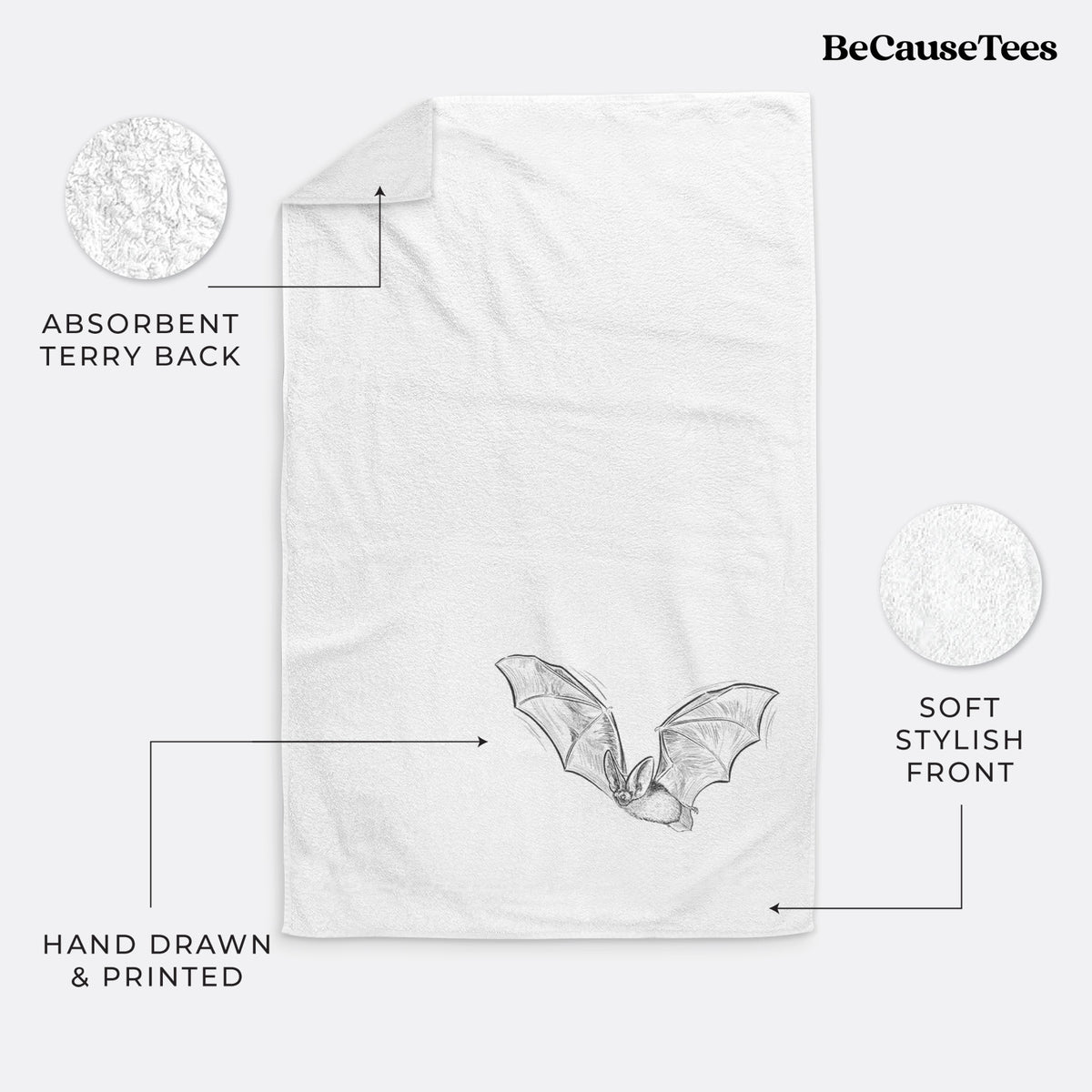 White hand towel printed with a black ink illustration of a spotted bat in flight with large ears.