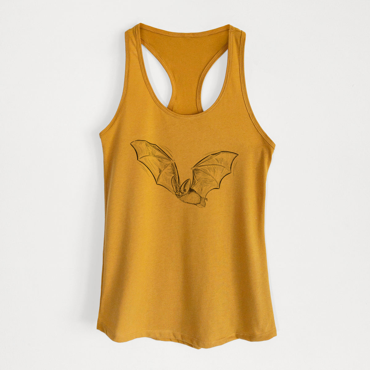 Gold women's racerback tank top laid flat, printed with a black ink illustration of a spotted bat in flight with large ears.