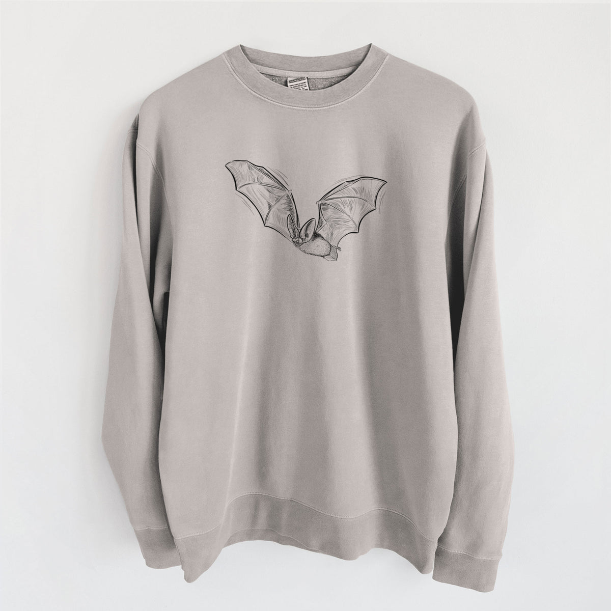 Cement grey pigment dyed crewneck sweatshirt laid flat, printed with a black ink illustration of a spotted bat in flight with large ears.