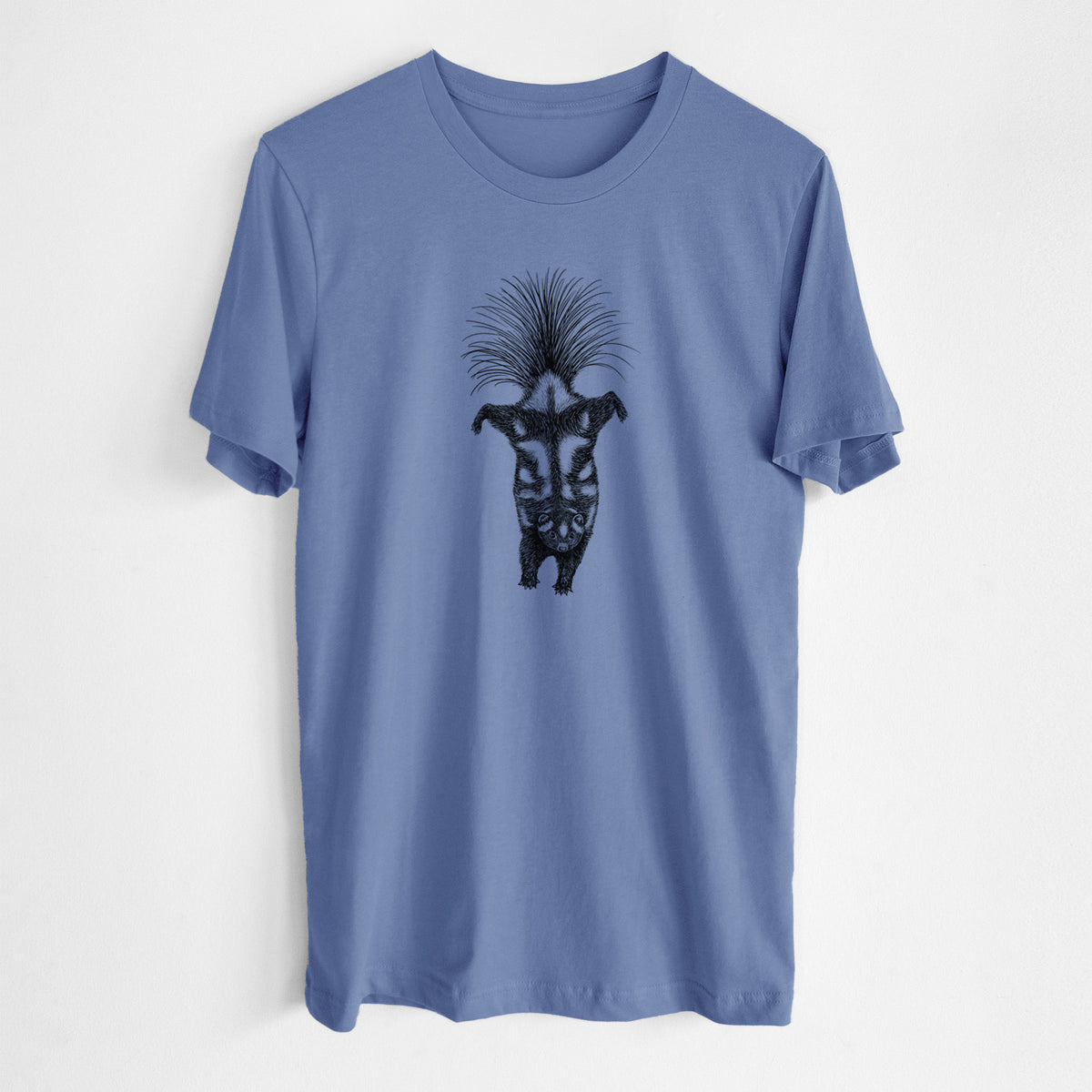 Blue bell lightweight cotton t-shirt laid flat, printed with a black ink illustration of a spotted skunk doing a handstand with its tail fanned.